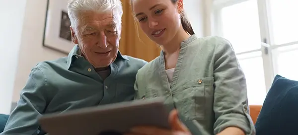 HR manager using digital leave management software to track employee leave