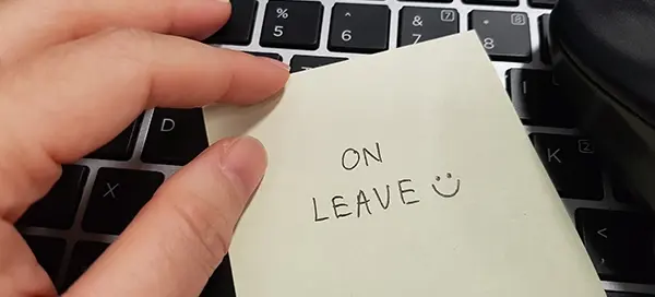 HR manager managing employee leave requests using emails and spreadsheets