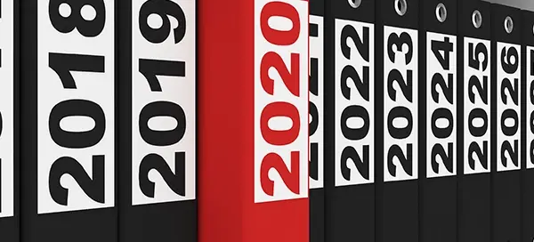 HR professional reviewing employee holiday records and annual leave history