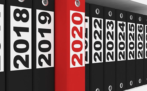 HR professional reviewing employee holiday records and annual leave history